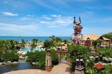 Swimming pool at the beach of popular hotel, Pattaya, Thailand clipart