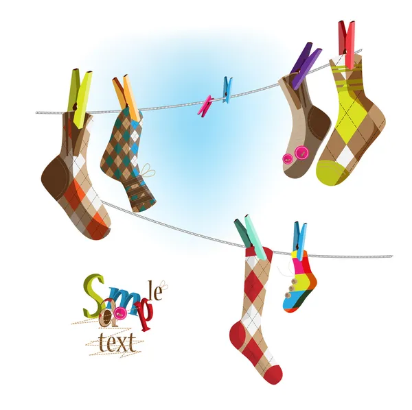 Socks on a rope — Stock Vector