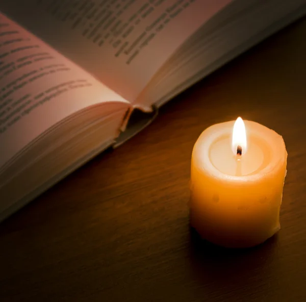stock image Book in candlelight