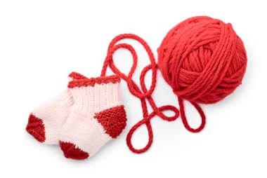 Socks and skein on a white background clipart