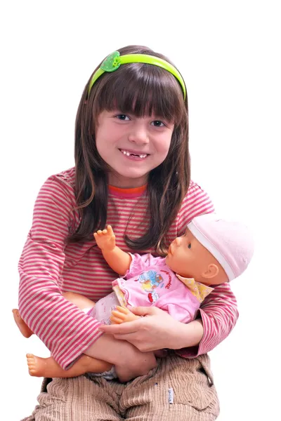 Bebek ile gülümseyen kız — Stok fotoğraf