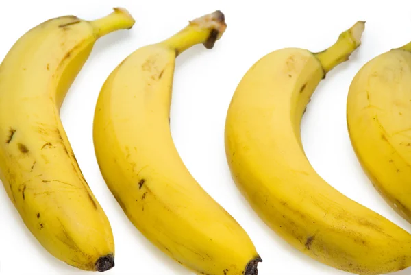 Группа бананов изолирована на белом фоне — стоковое фото