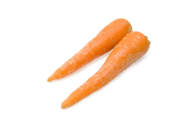 Zanahorias frescas aisladas sobre un fondo blanco —  Fotos de Stock