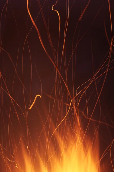 Branden van vlam of brand, geïsoleerd op zwarte achtergrond — Stockfoto
