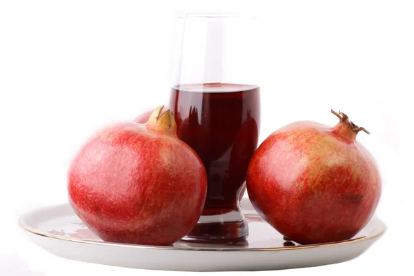Egy pohár gránátalma gyümölcslé elszigetelt fehér background — Stock Fotó