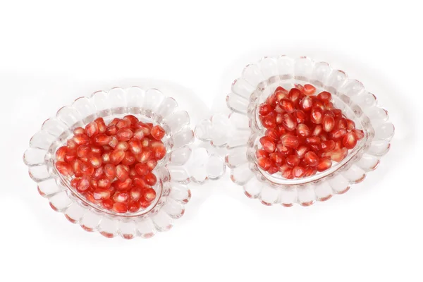 Pomegranate seeds in a vase — Stock Photo, Image