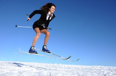 Businesswoman on ski hurry to work clipart