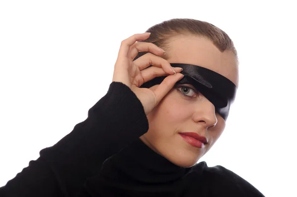 Játékos nő fekete szalaggal, a szem — Stock Fotó
