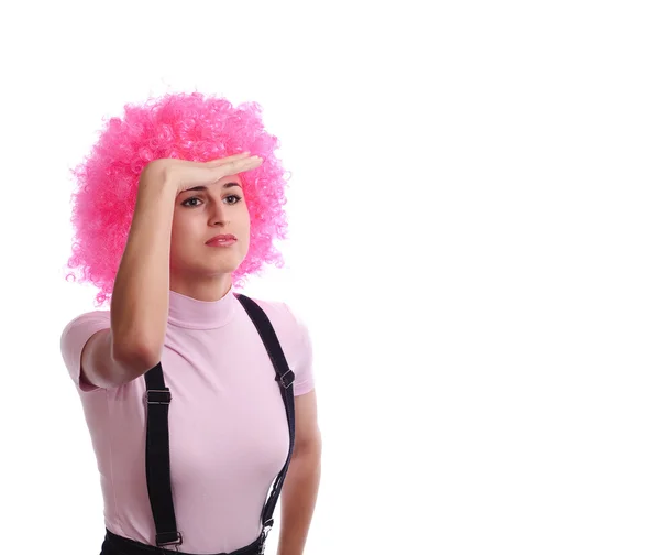 Mädchen Pinkfarbener Perücke Schaut Umher Isoliert Auf Weiß — Stockfoto