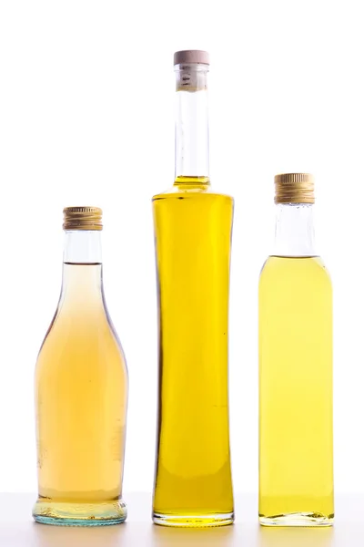 Bottles of olive oil and wine vinegar — Stock Photo, Image
