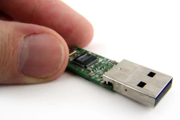 USB Flash in fingers — Stock Photo, Image