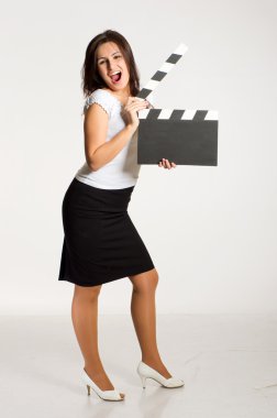 Woman holding a clapper clipart