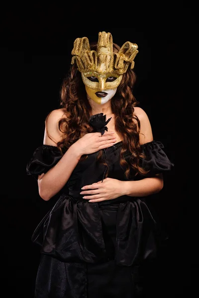 Woman in golden party mask — Stock Photo, Image
