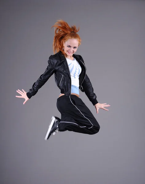 Young woman jumping — Stock Photo, Image