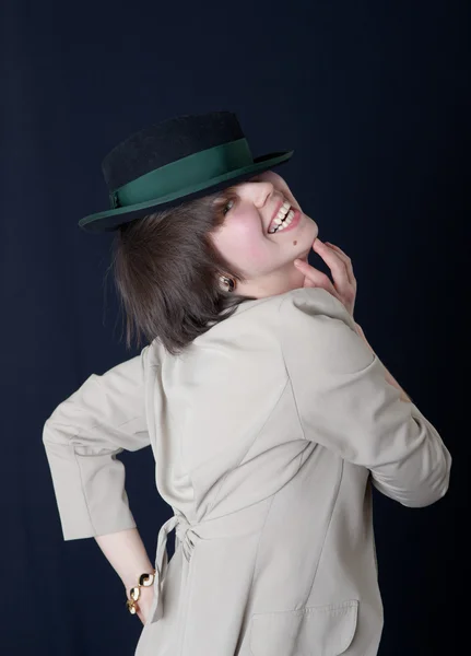 Cheerful girl in a hat — Stock Photo, Image