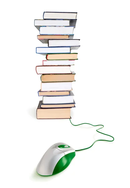 Stack of books and computer mouse — Stockfoto