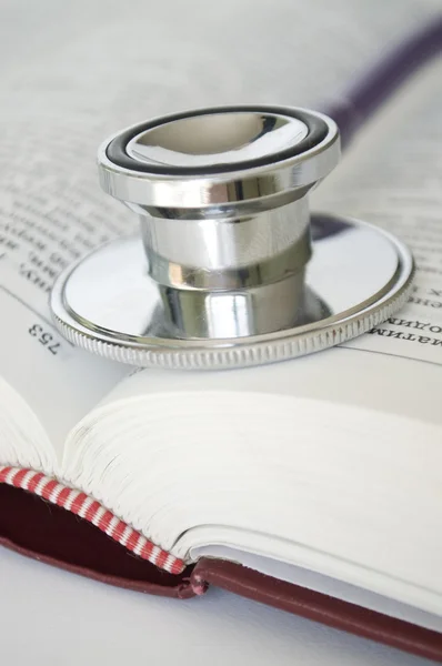 Stethoscope on the book — Stock Photo, Image