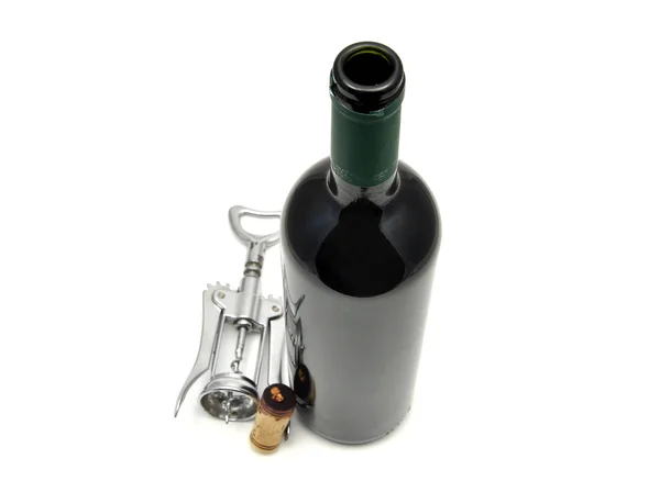 Красное вино и штопор — стоковое фото