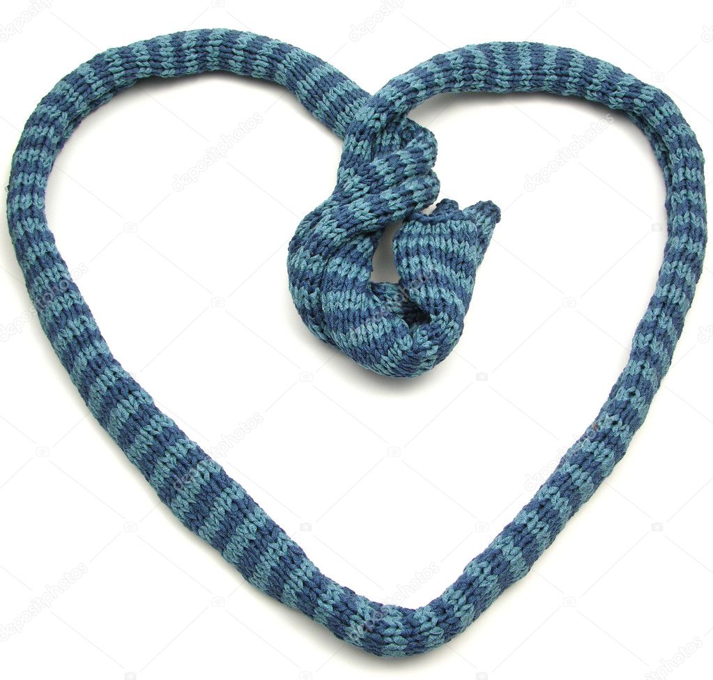 Blue striped knitting scarf arranged as heart on white