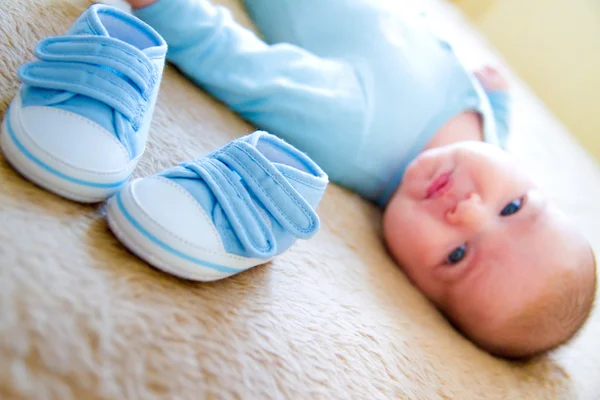 Babystiefel Mit Baby Hintergrund — Stockfoto