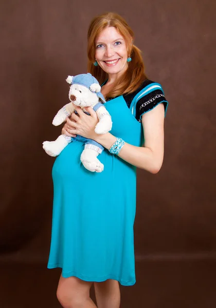 Беременная молодая женщина Стоковое Фото