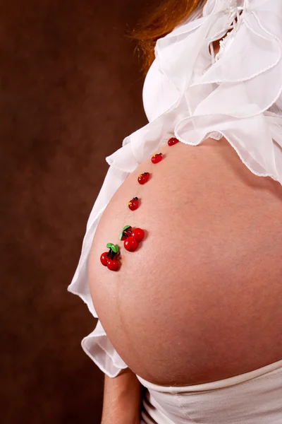Zwangere Jonge Vrouw Witte Blose Met Grappige Motief Buik Stockafbeelding