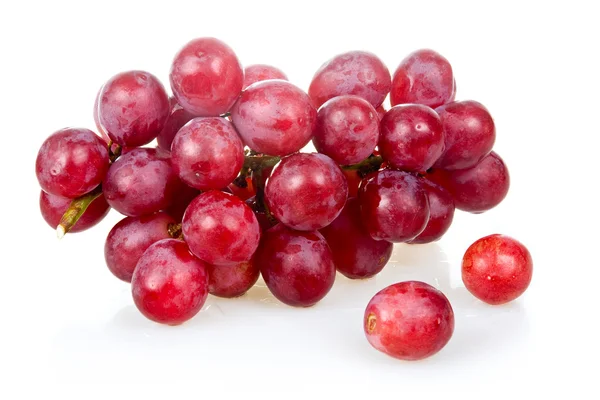 Bunch of ripe pink grapes isolated — Stock Photo, Image