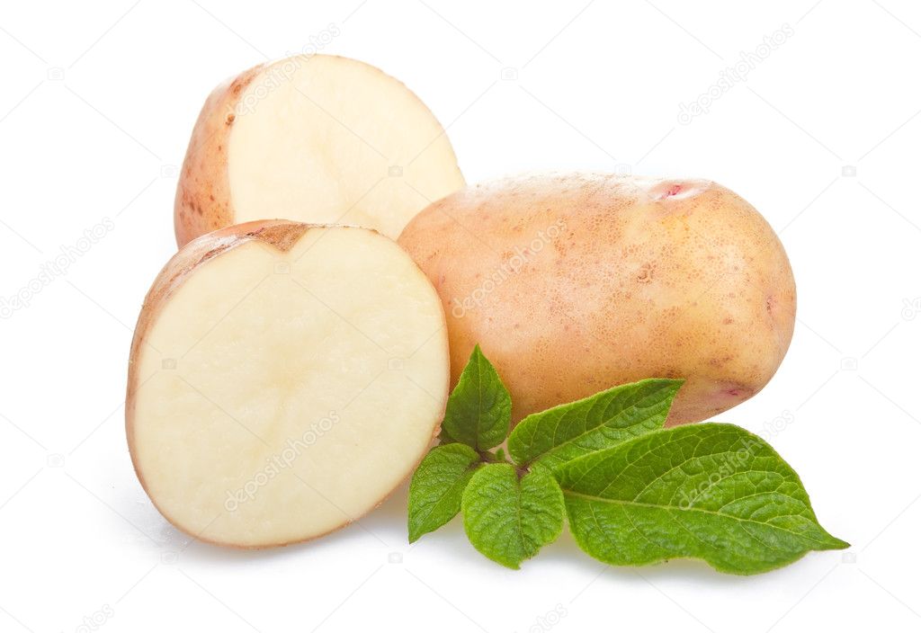 Heap of ripe potatoes vegetable with green leafs isolated on white background