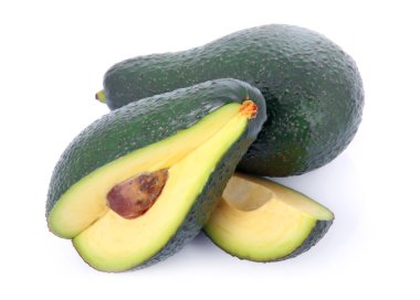 Ripe sliced avocado fruits isolated