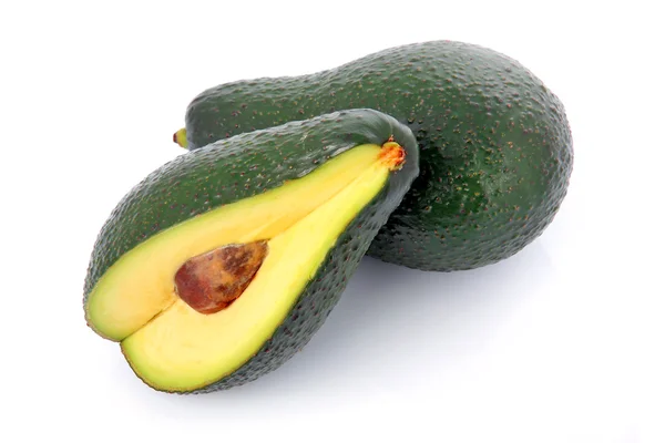 Ripe sliced avocado fruits isolated — Stok fotoğraf