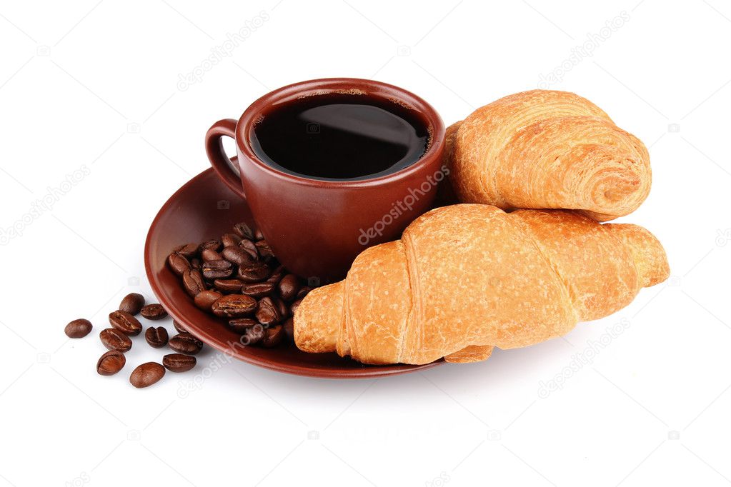 Croissants, cup of coffee and beans isolated on white
