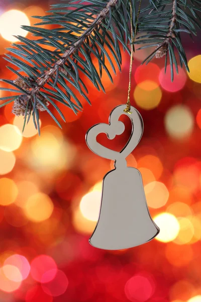 Christmas bell against blurred background — Stock Photo, Image