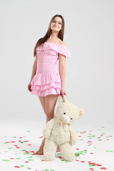 Brunette girl with teddy bear — Stock Photo, Image