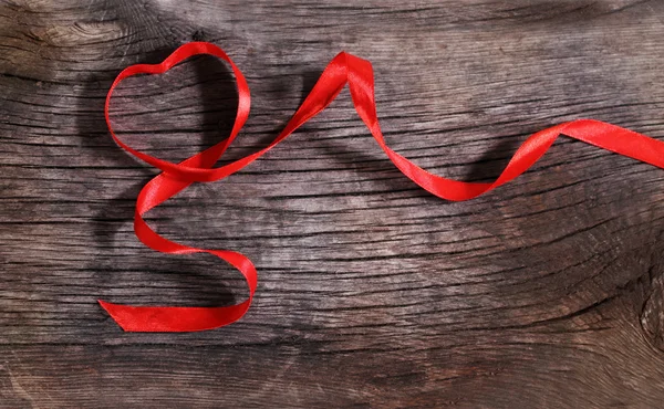 Heart shaped red ribbon — Stock Photo, Image