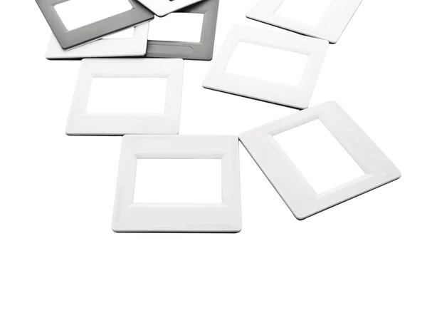 Cornici per una foto - diapositive isolate su sfondo bianco Immagine Stock