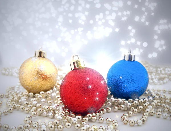 Sparkling Christmas decorations with a background from a bokeh and sparks — Stock Photo, Image
