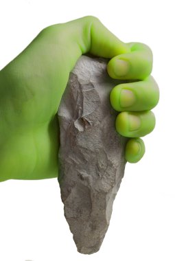 Yeşil kişi bir keski tutar .