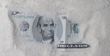 Dollar In The Sand Horizontal. clipart