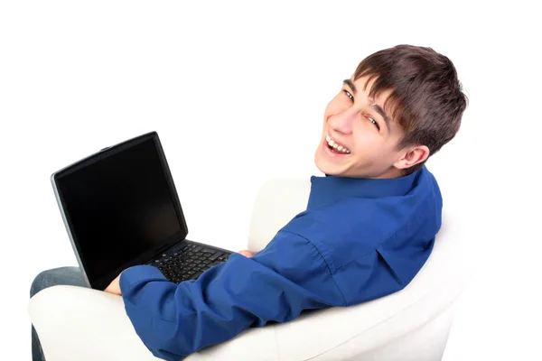 Adolescent avec ordinateur portable Images De Stock Libres De Droits