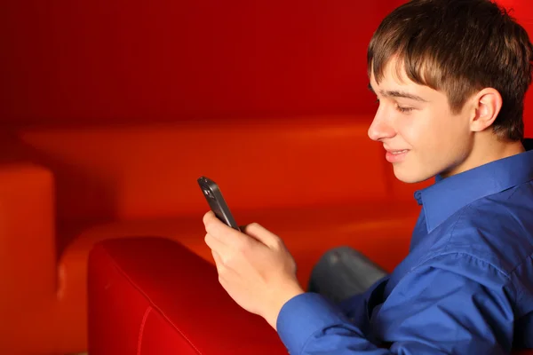Teenager with phone — Stock Photo, Image