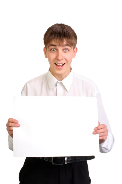 Teenager holding blank paper — Stock Photo, Image