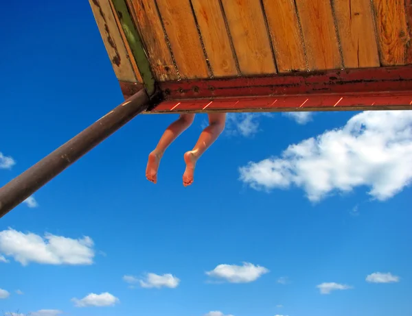 Benen hängande — Stockfoto