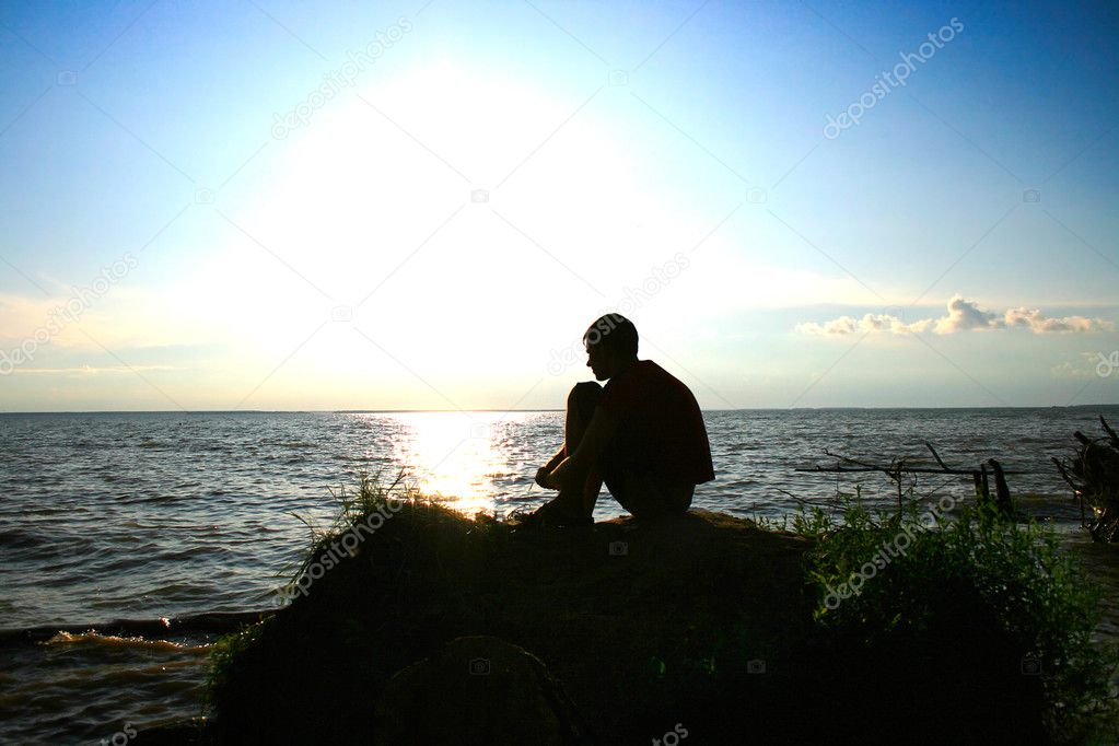 Young man on a sunset