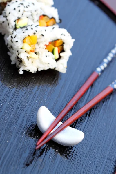 Chopsticks sushi — Stock Photo, Image