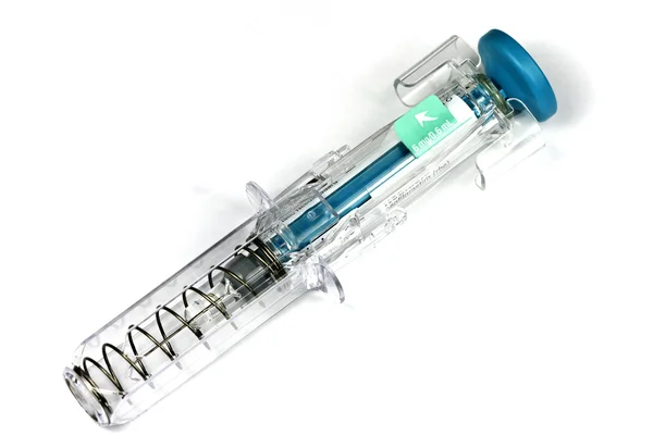 Syringe with retractable needle — Stock Photo, Image