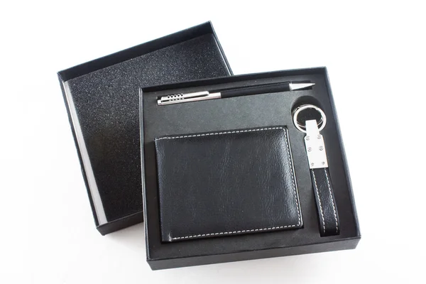Egy üzletember pénztárca bőrből, toll és kulcskarikával — Stock Fotó