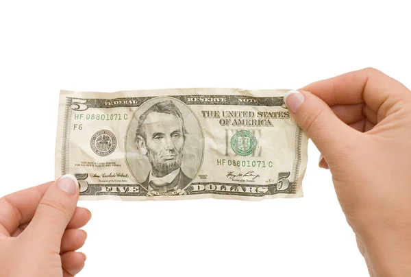 The crumpled banknote in a hand — Stock Photo, Image