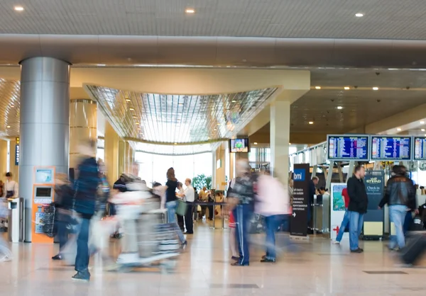 Blurred advancing through airport installations — Stock Photo, Image