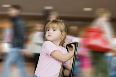 The girl one at the airport. The background is washed away clipart