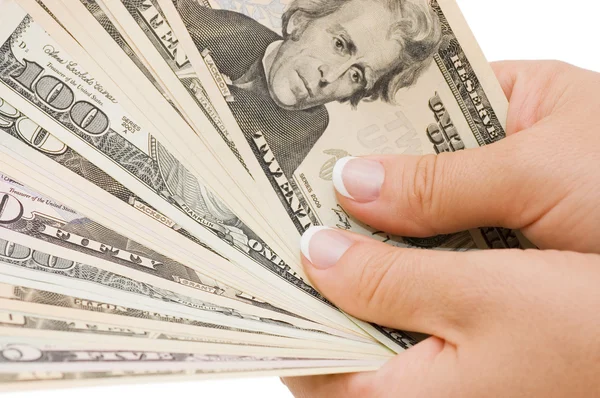 Geld in der Hand, isoliert auf weißem Hintergrund — Stockfoto